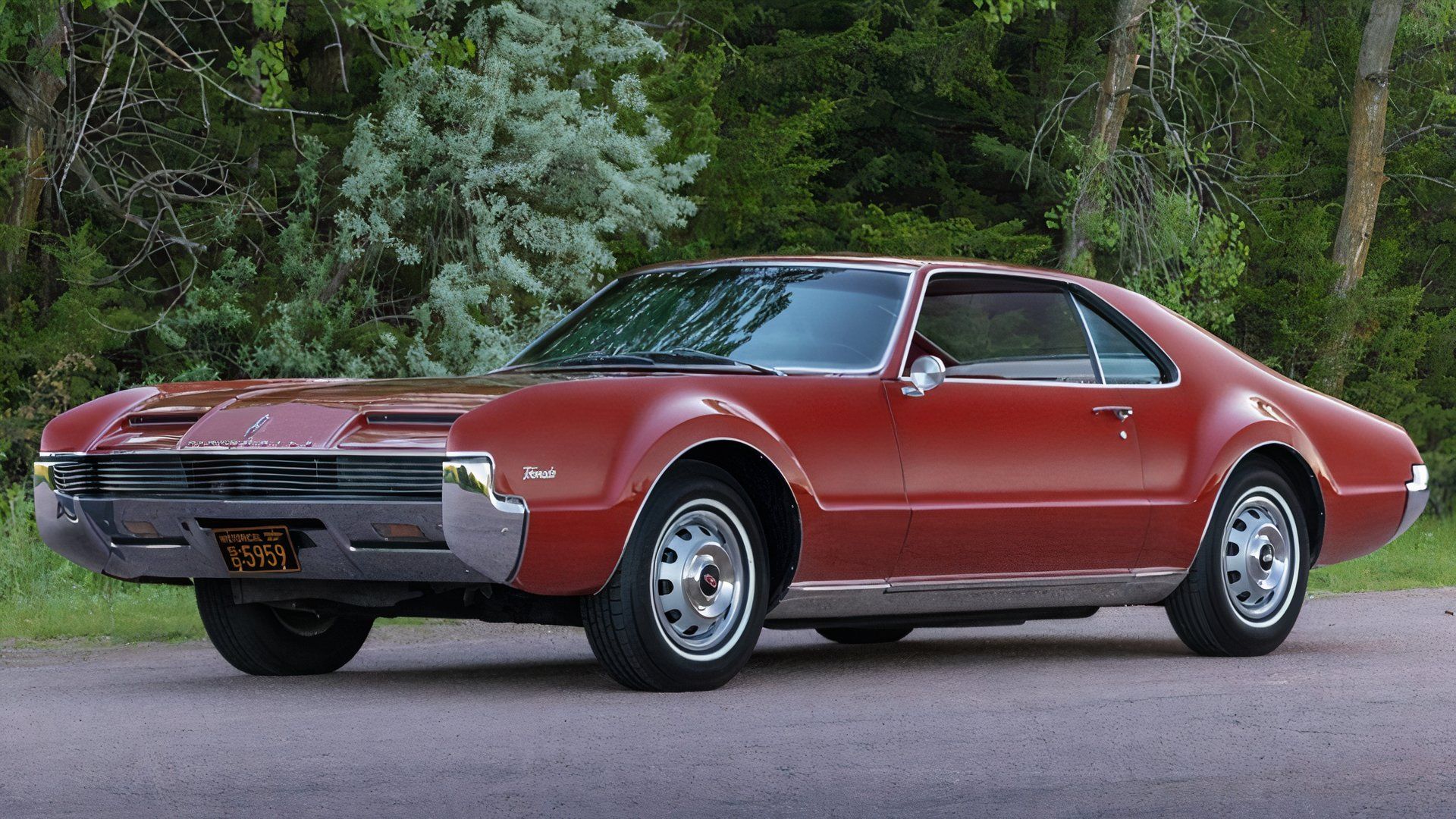 3/4 side view of 1966 Oldsmobile Toronado